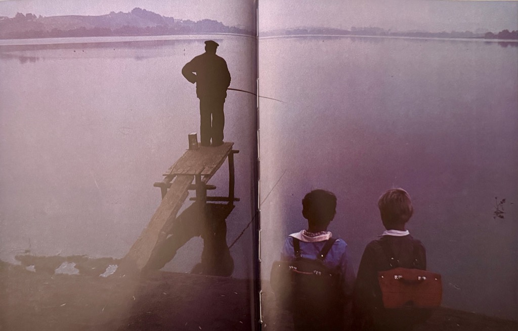 Kashubian lake and boys fishing