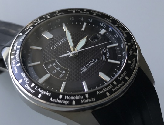 Dial of the Citizen CB0021-06E with the Eco-Drive name and a city ring